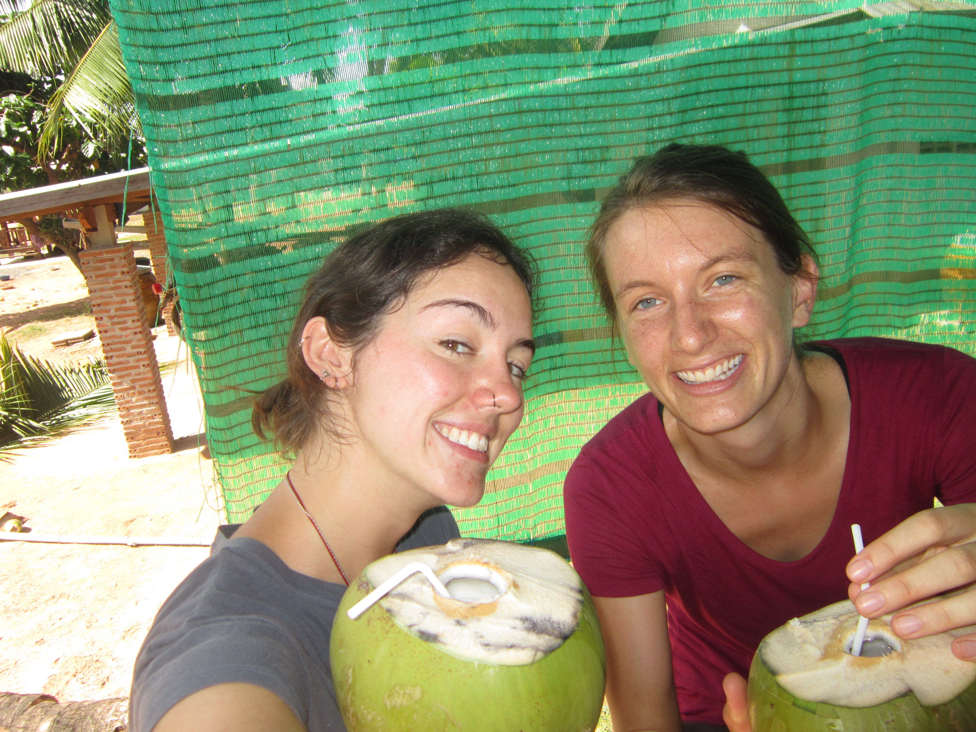 Drinking coconuts and laughing in Nong Weang, Thailand