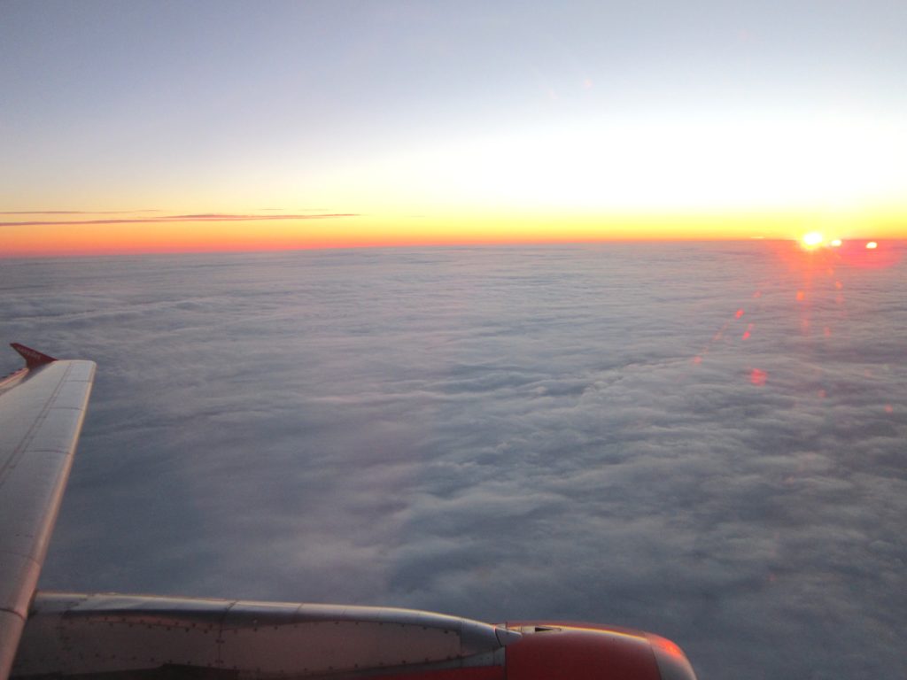sunrise Easyjet plane flight clouds 
